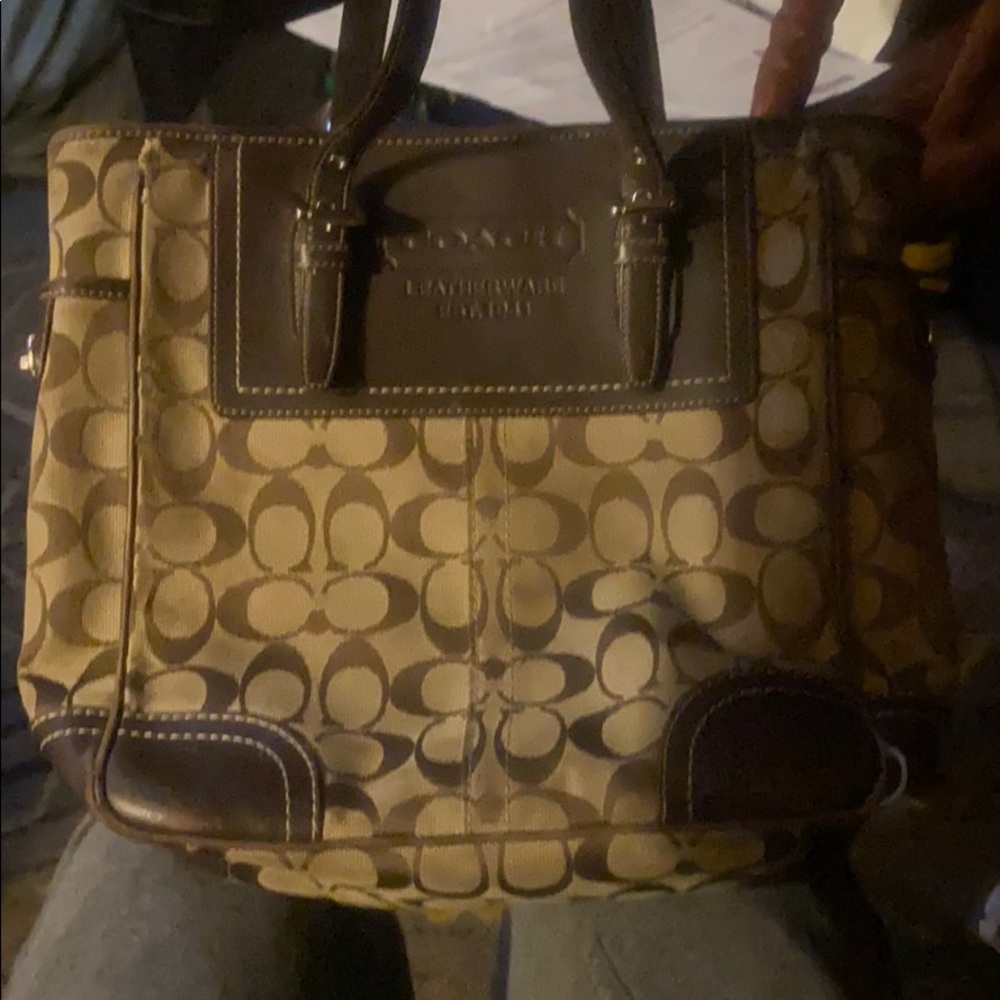 Authentic- lightly used - coach pocketbook